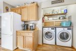 Convenient laundry area in the kitchen